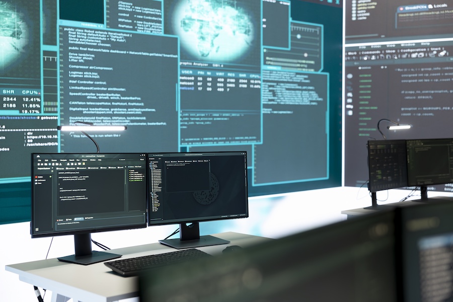 Cyber security monitoring room with high tech equipment. Governmental focus on cyber operations, cyber surveillance, and digital threats protection in an empty command workspace.